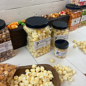 
            
                Load image into Gallery viewer, Jalapeno Pepper Flavored Gourmet Kettle Corn Grip Jar, Assorted Sizes
            
        